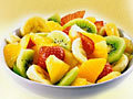 Joc Cooking a fruit salad